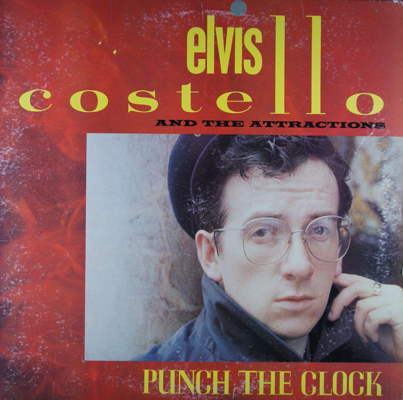 O86. ELVIS COSTELLO AND THE ATTRACTIONS – PUNCH THE CLOCK ~ USA ~